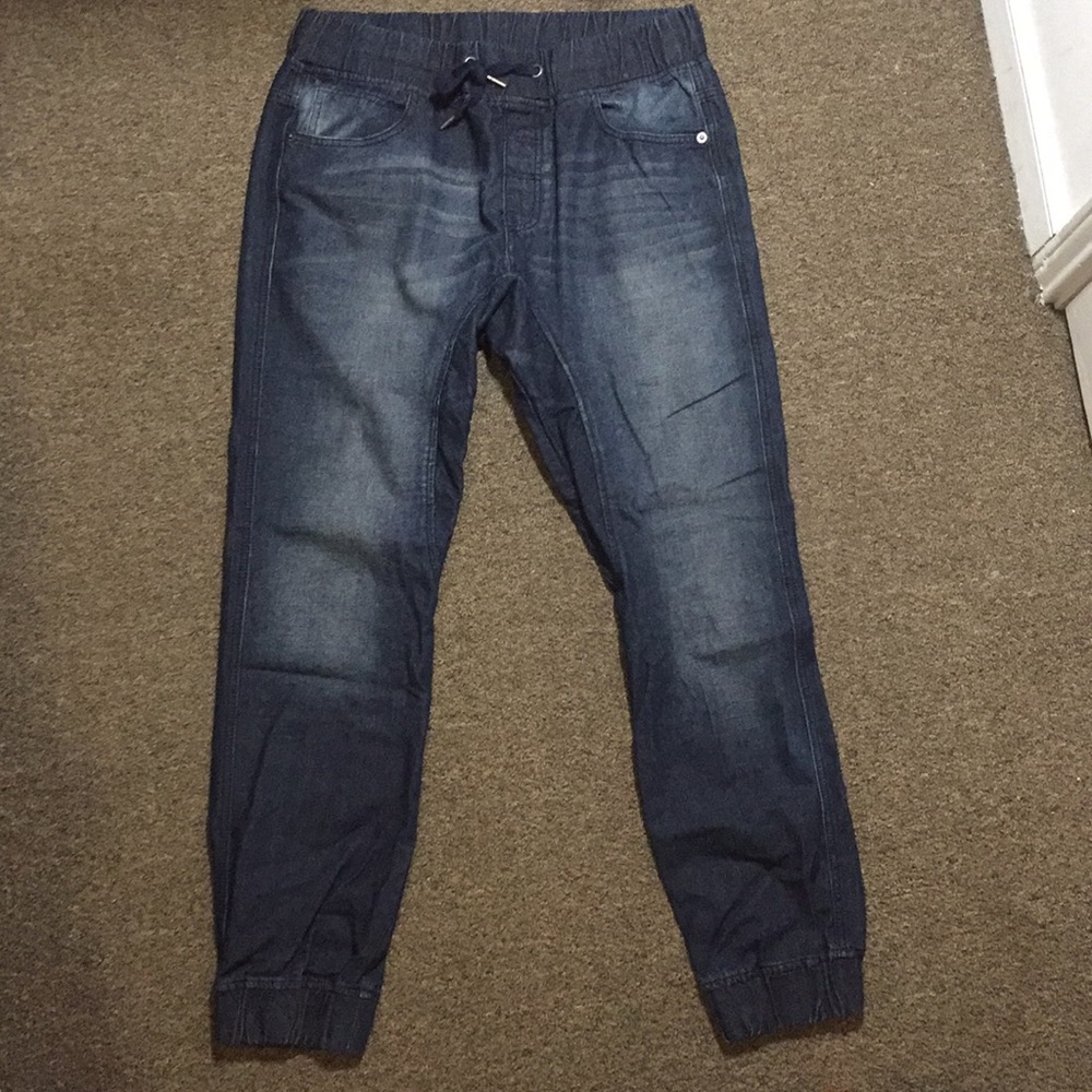 Blue denim joggers.